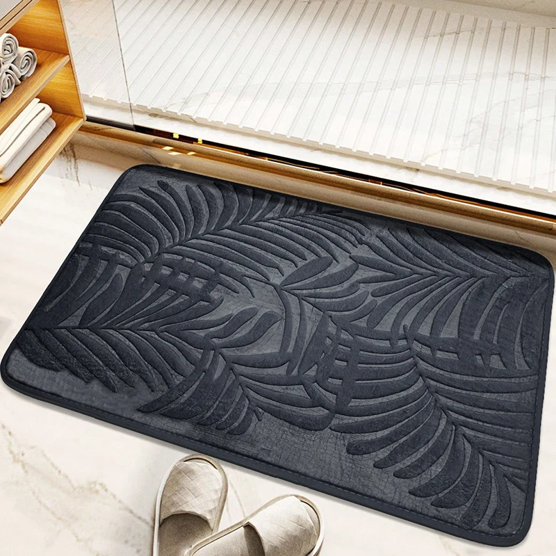 Tropisches Blattdesign Badmatte