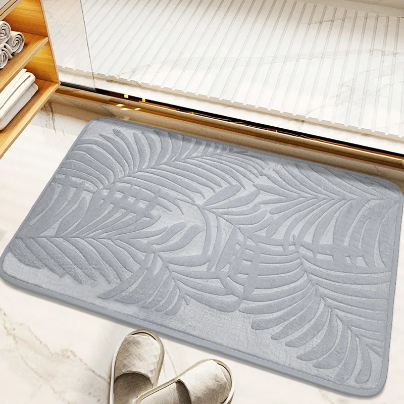 Tropisches Blattdesign Badmatte