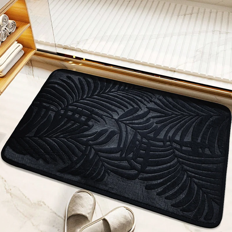 Tropisches Blattdesign Badmatte