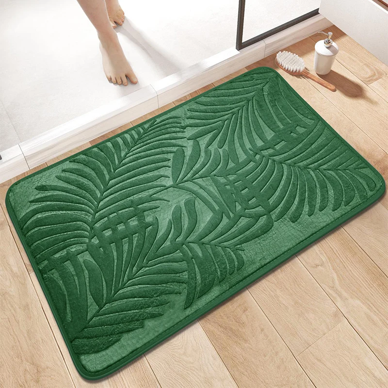 Tropisches Blattdesign Badmatte
