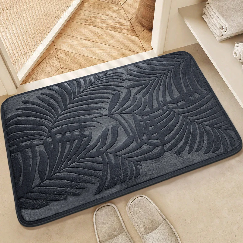 Tropisches Blattdesign Badmatte