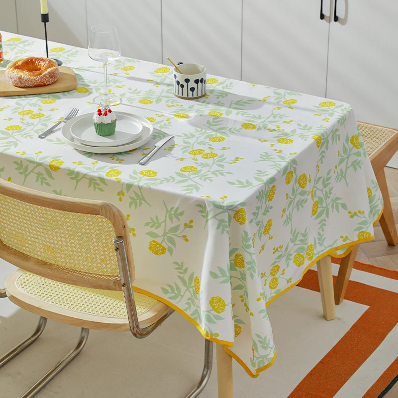 Rechteckige abwaschbare Baumwoll-Polyester Tischdecke mit kontrastierter Zierkante und botanischem Druck