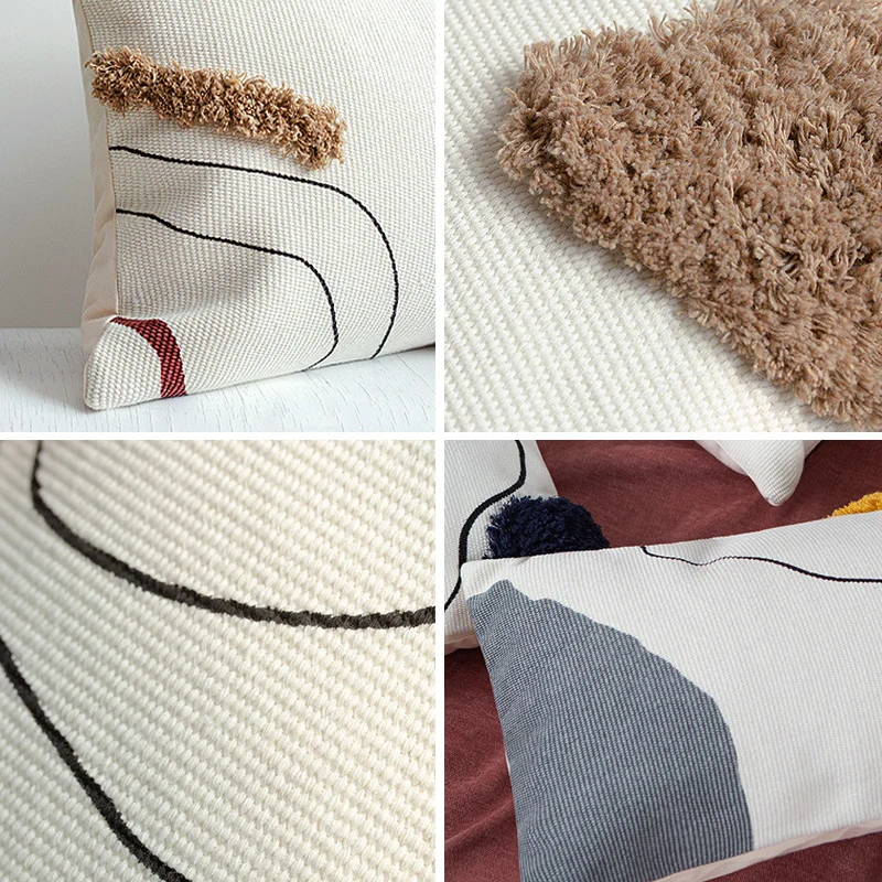 Gewebter Dekokissenbezug im abstrakt-minimalistischen Scandi‑Look mit handtufteten Applikationen