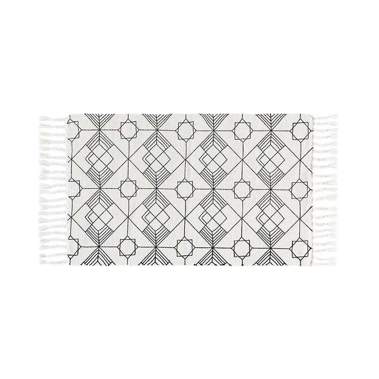 Flachgewebter Baumwoll-Tischläufer im Art-Deco‑Geometrie‑Jacquard mit handfransiger Kante