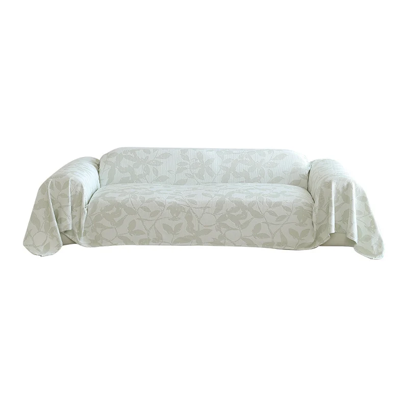 Elastischer Sofa‑Schonbezug mit floraler Reliefstruktur und universeller Passform