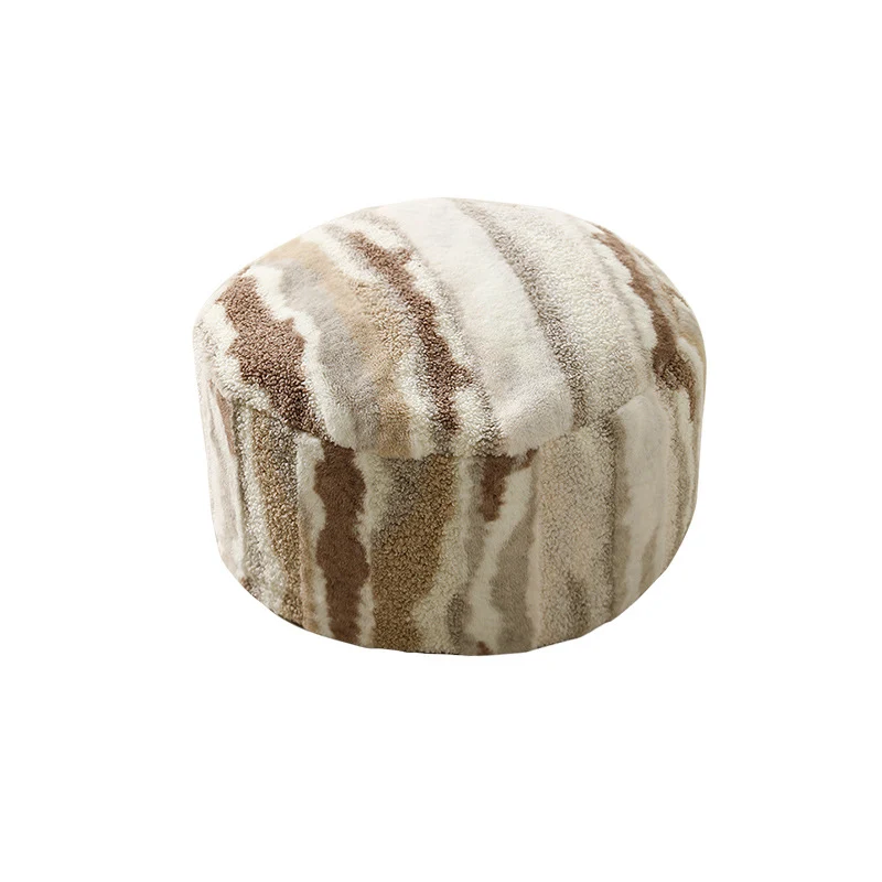 Rundes Sitzpouf aus Teddy‑Fleece mit weichem Strukturbezug