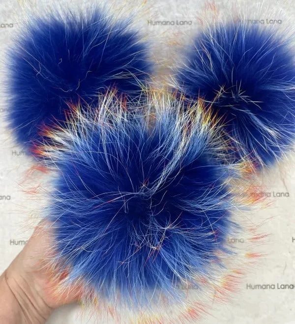 Royal blue fur pom-poms with orange tips, 17 to 20 cm