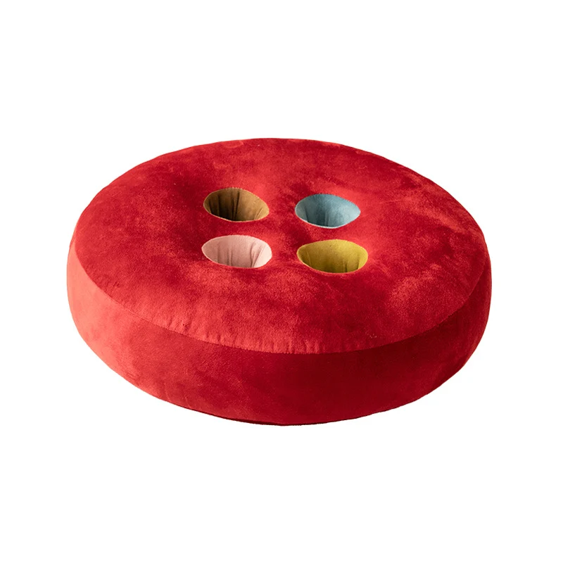Runder Bodensitzpouf im Knopf‑Design mit Samtbezug, farbigen Ösen und formstabilem Schaumkern