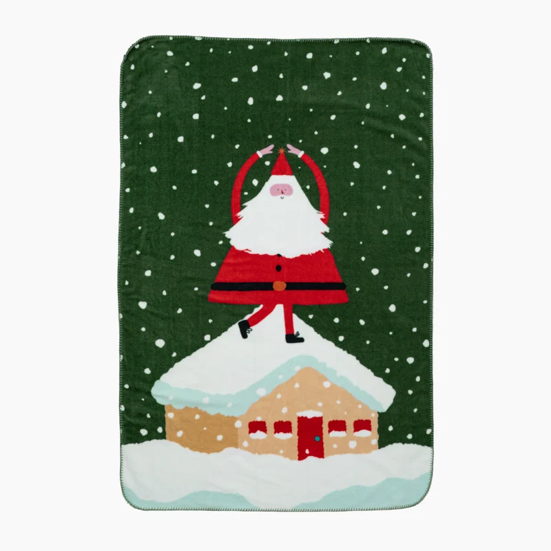 Weihnachtskuscheldecke mit Geschenk- und Lebkuchenmuster