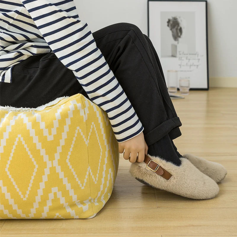 Gepolsterter Fußhocker‑Pouf mit Flauschoberseite und gewebtem Diamantmuster