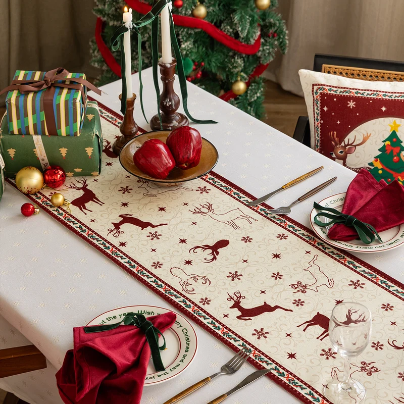 Weihnachts-Tischläufer mit Jacquard‑Rentiermotiven und dekorativem Bordürenrand