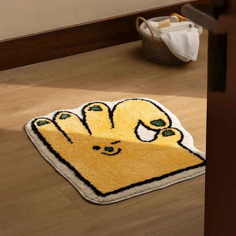 Geformter Badteppich in Handform mit tuftierter Chenille‑Textur und rutschfester Unterseite