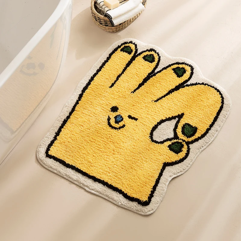 Geformter Badteppich in Handform mit tuftierter Chenille‑Textur und rutschfester Unterseite