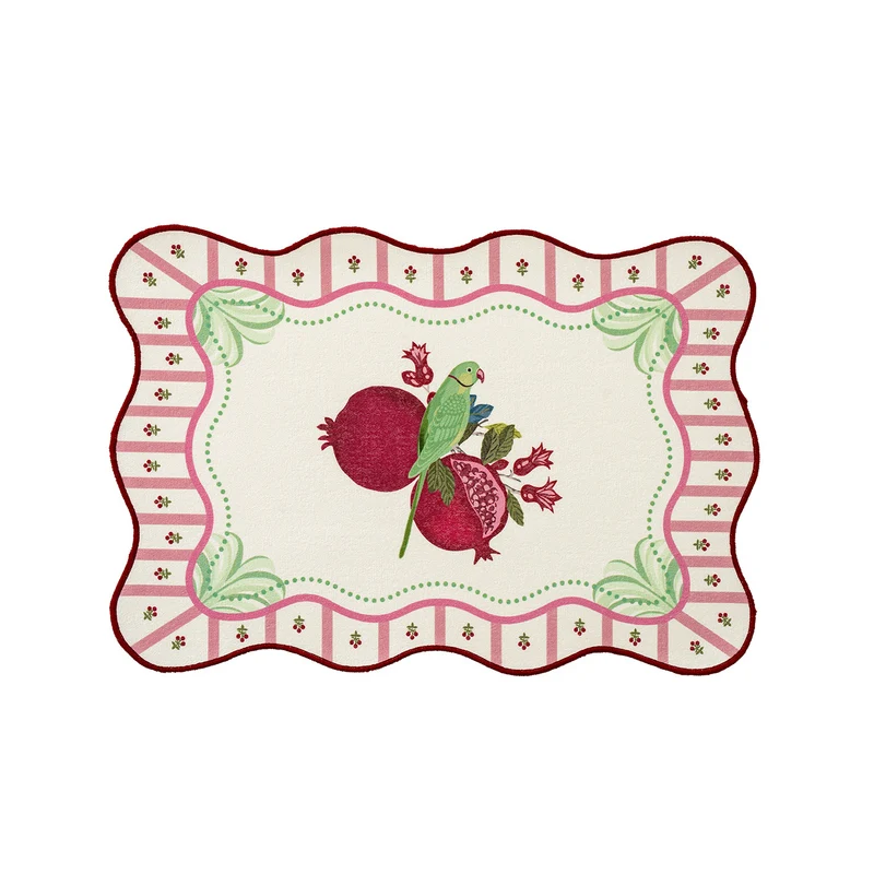 Geformtes Tischset aus Baumwollmix mit Granatapfel- und Papageien-Motiv