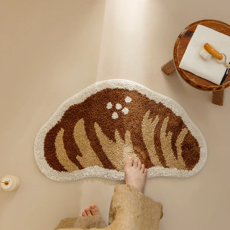 Niedlicher runder Teppich- und Badvorleger in Keksform mit tuftiger Florstruktur