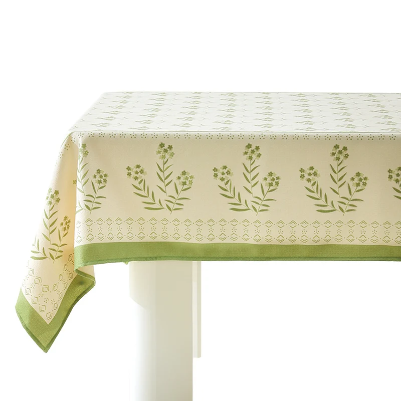 Baumwollmix‑Tischdecke mit eingewebtem Blumenbordüren‑Dekor und grünem Saum