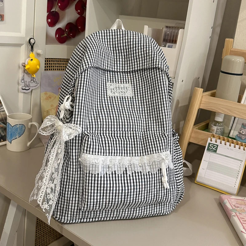 Charmantes gestreiftes Rucksack mit Spitzenbesatz Karnz
