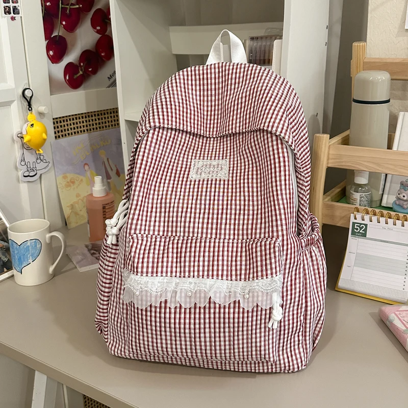 Charmantes gestreiftes Rucksack mit Spitzenbesatz Karnz