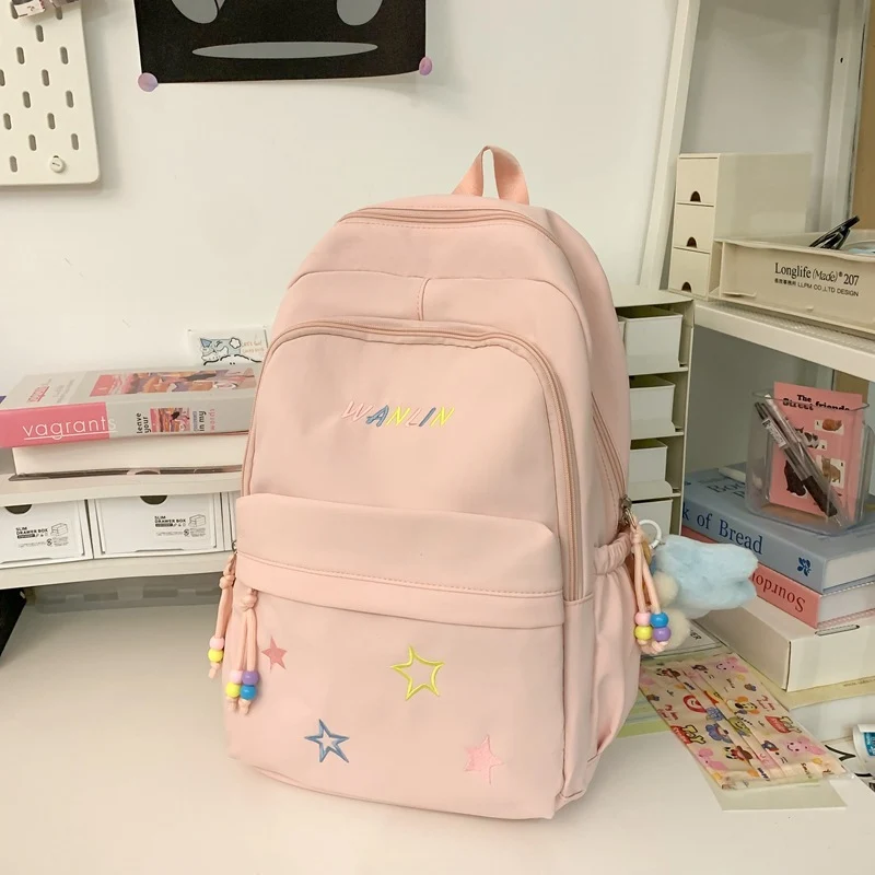Verspielter mit Sternen verzierter Rucksack Karnz