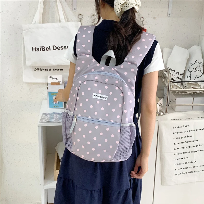 Verspielter gepunkteter Rucksack Karnz