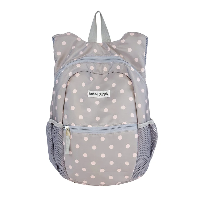 Verspielter gepunkteter Rucksack Karnz