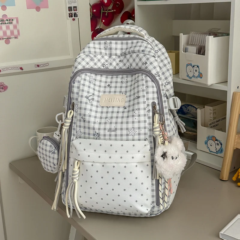 Dekorativer Rucksack mit Karos und Sternenmuster Karnz