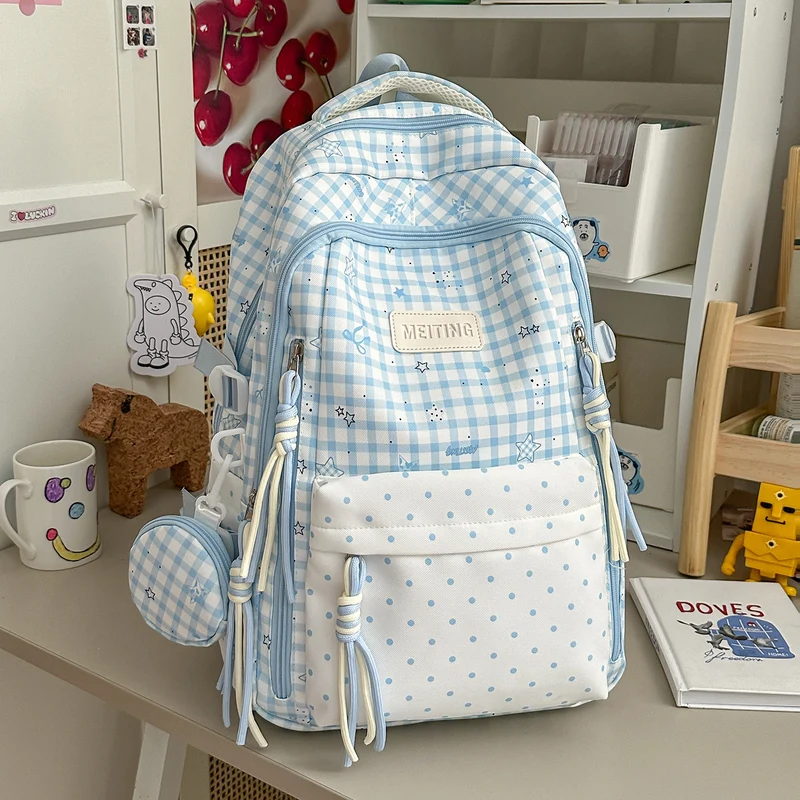 Dekorativer Rucksack mit Karos und Sternenmuster Karnz