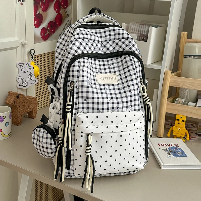 Dekorativer Rucksack mit Karos und Sternenmuster Karnz