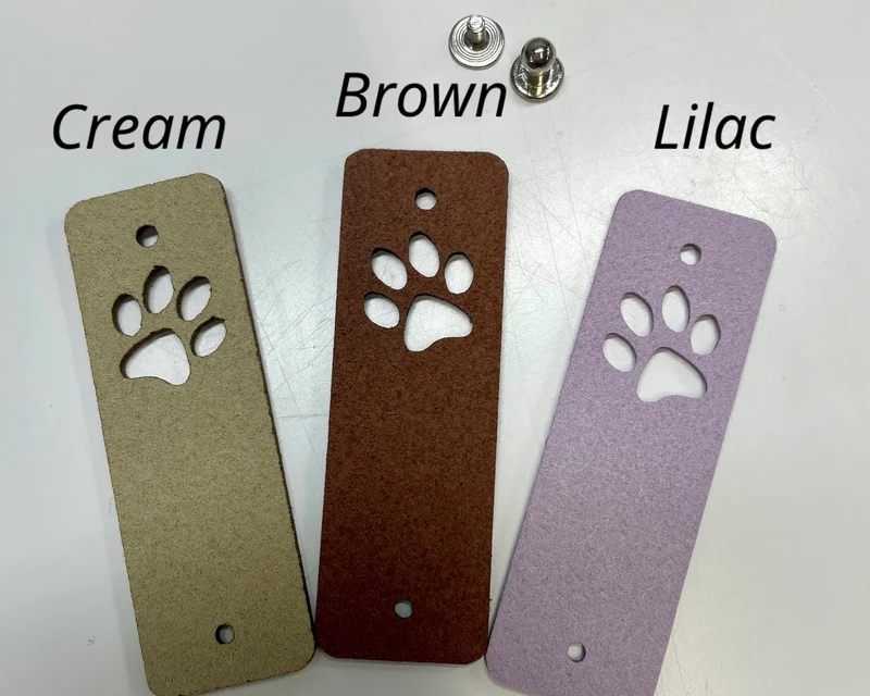 Tag with rivet (Cat footprint)