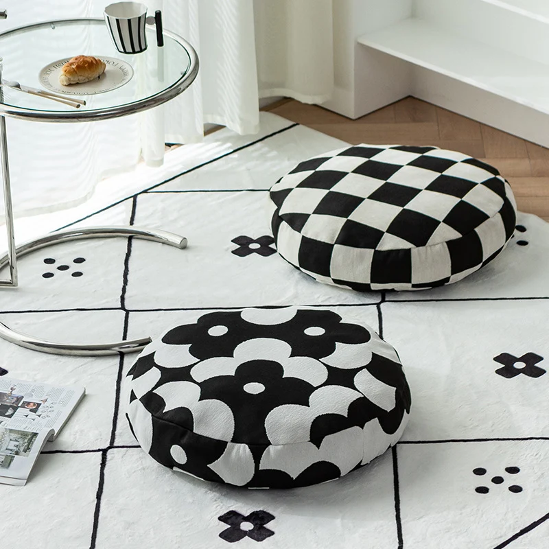 Rundes dekoratives Sitzkissen mit floraler Jacquard‑Struktur