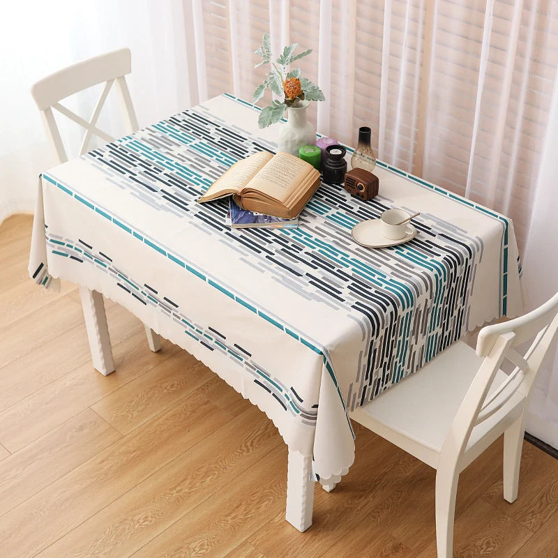 Runde abwaschbare Tischdecke mit feinem Karo‑Gittermuster und welligem Saum