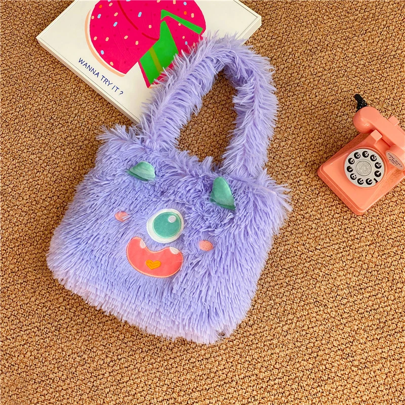 Verspielte Monster Plüschtasche