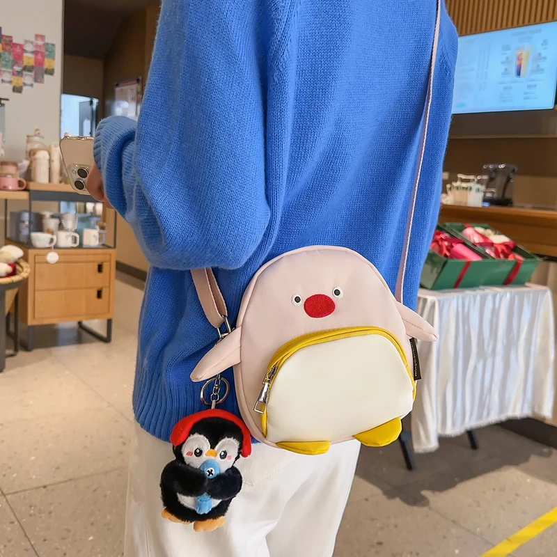 Verspielte Pinguin-Themen Umhängetasche