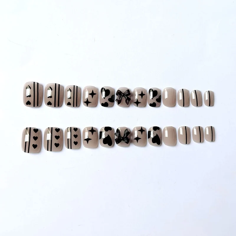 Künstlerisches Nageldesign-Kit mit Schleifenakzenten