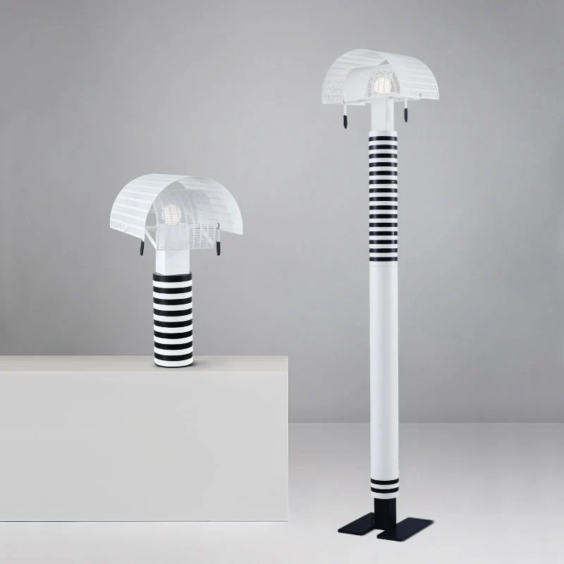 Moderne dekorative Tischlampe mit gestreiftem Fuß