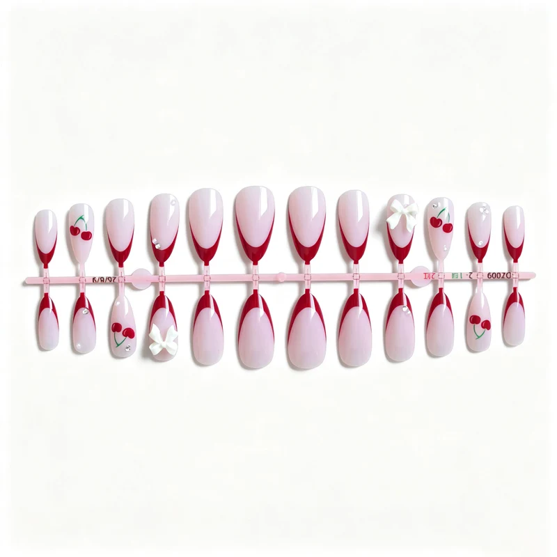 Künstlerisches Kirsch- und Schleifen-Nageldesign