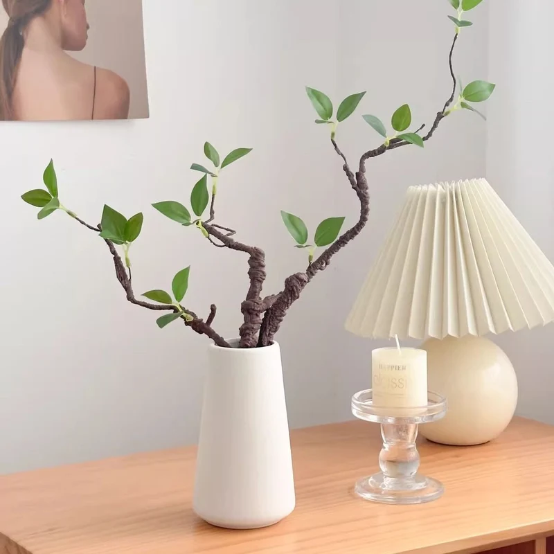 Künstlerische dekorative Zweigarrangement