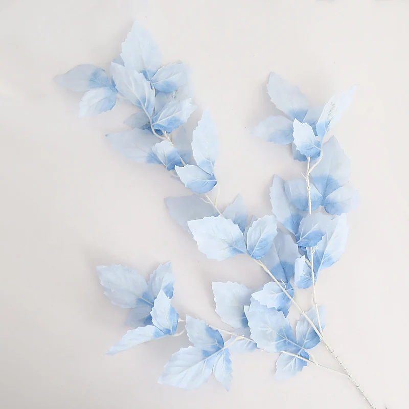 Elegante Faux-Blatt-Stamm-Anordnung