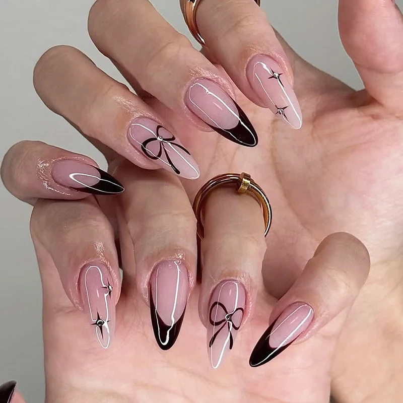 Kunstnagelset mit elegantem Ombre-Design und kreativem Schleifenmotiv Karnz
