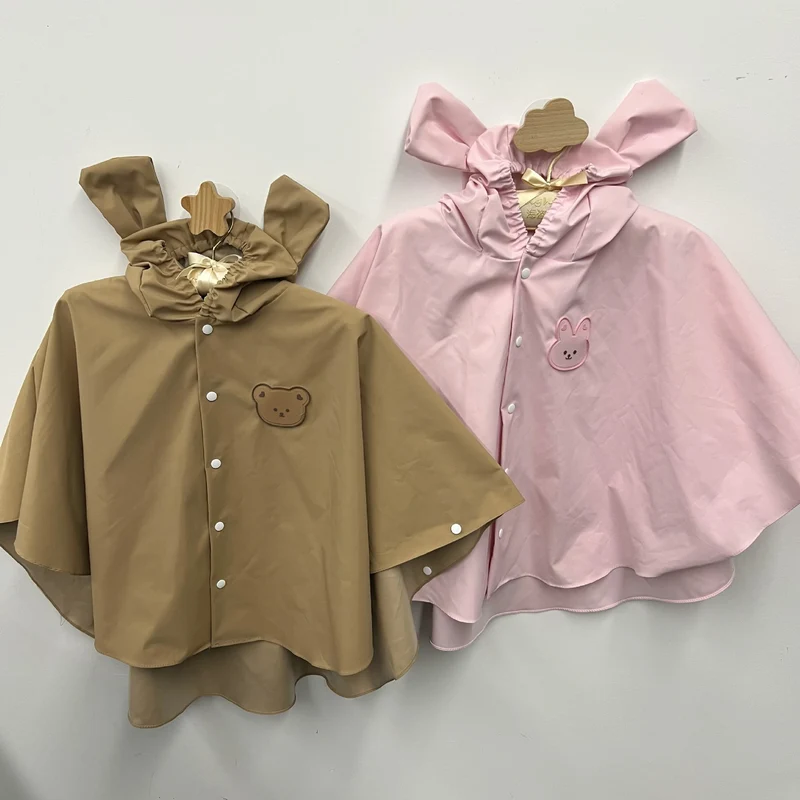 Wasserdichter Kinder Regenponcho mit Kapuze und Hasenohr-Design mit Druckknopfverschluss