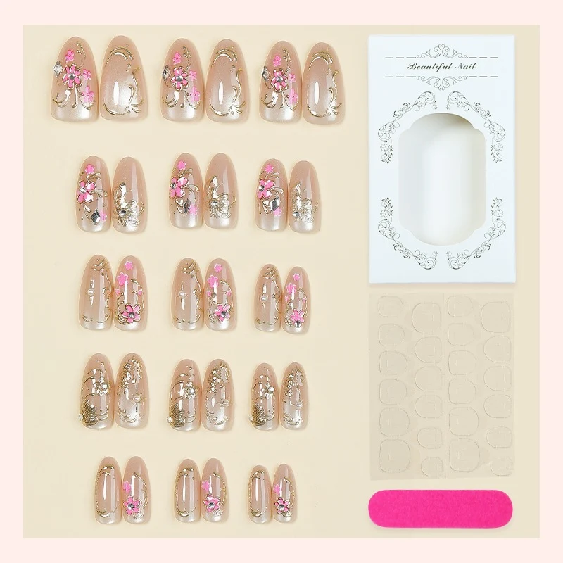 Glitzernde Kunstnägel mit floralem Design Karnz