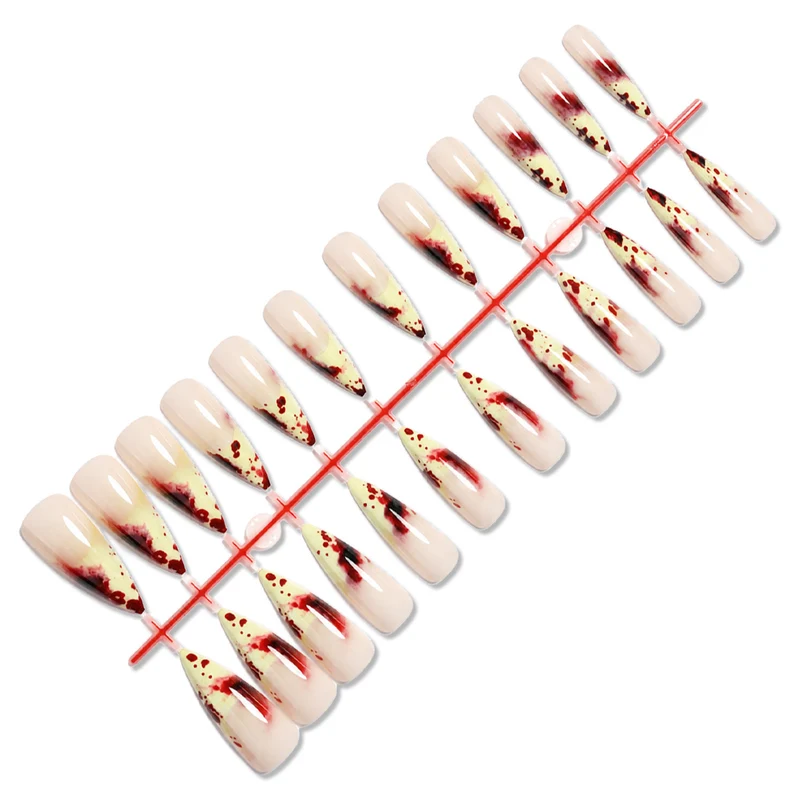 Kunstnagelset mit blutigen Akzenten und elegantem Stiletto-Design Karnz