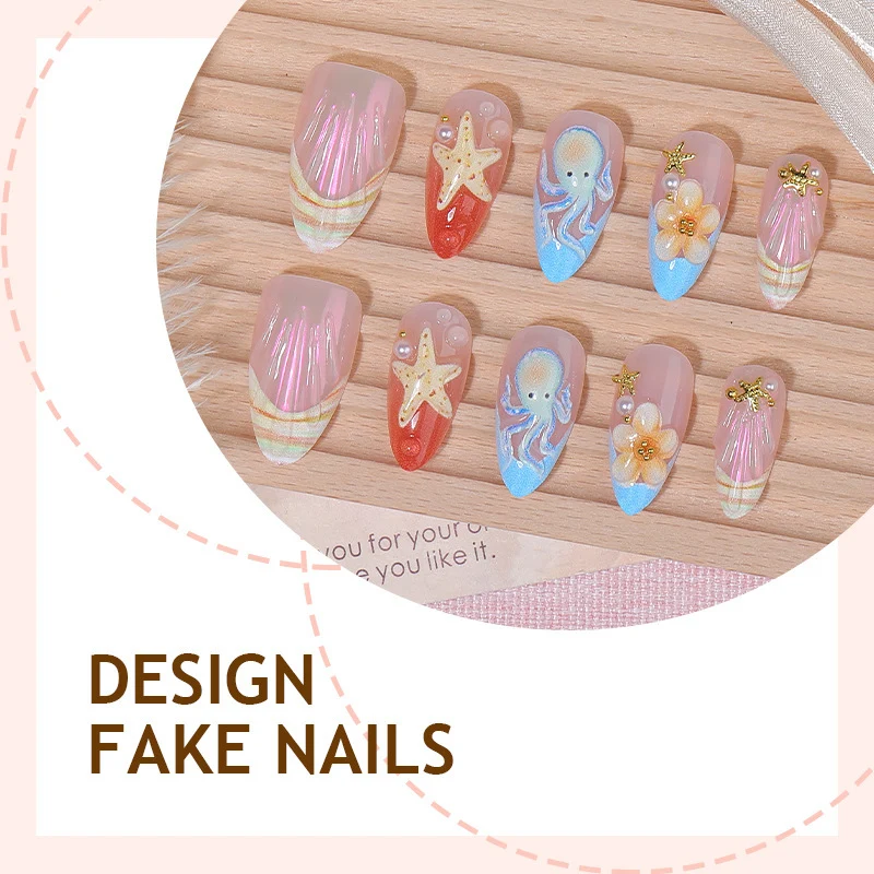 Kreatives Kunstnagelset mit maritimen Designs und eleganten Verzierungen Karnz