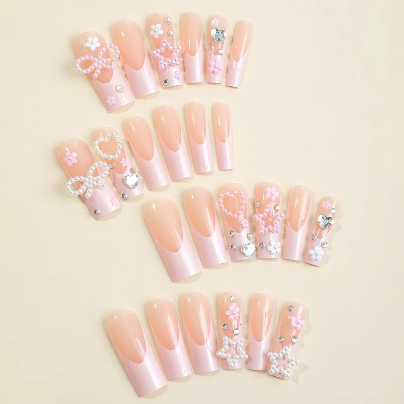 Glamouröses Kunstnagelset mit 3D-Schleifen und Glitzersteinen Karnz