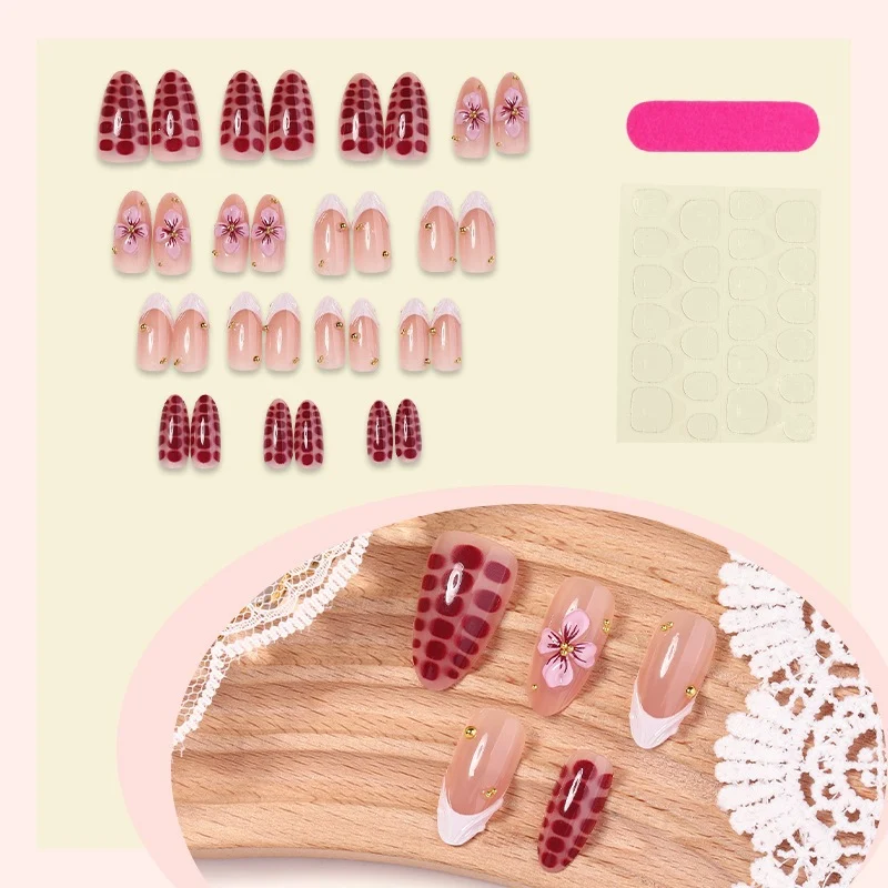 Kunstnagelset mit aufregenden Blumen- und Glitzermotiven Karnz