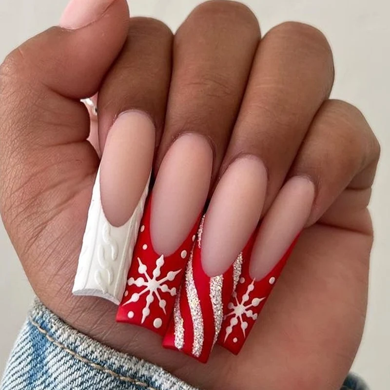 Kunstnagelset für festliche Anlässe mit eleganten Wintermotiven Karnz