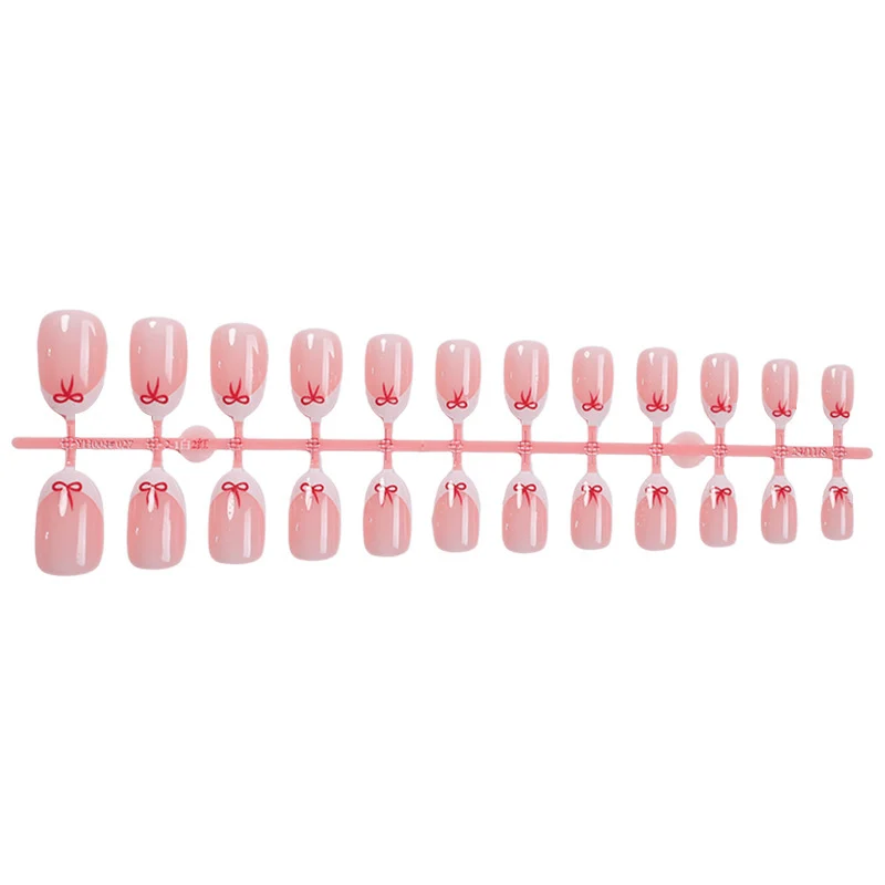Elegante Kunstnagel-Set mit zarten Schleifenakzenten Karnz
