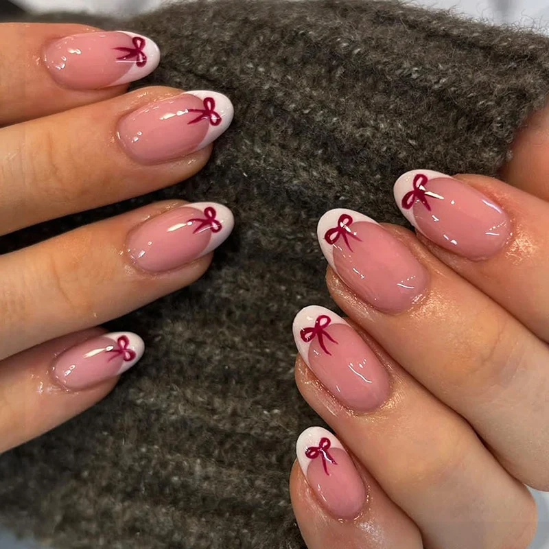 Kreatives Press-On Nagelkunstset mit Schleifen Design