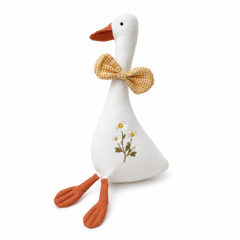 Handgefertigtes Leinen-Gans-Plüschspielzeug mit gesticktem Gänseblümchen-Motiv und Karobow