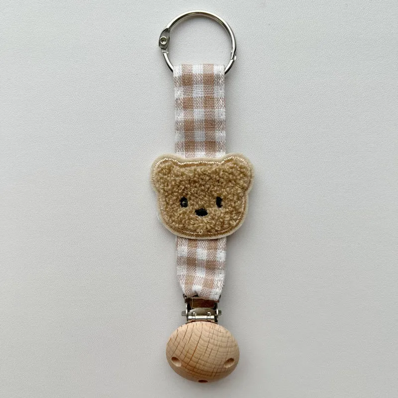 Bestickte Teddy Schnuller- und Beißclip mit Holz-Sicherheitsklammer
